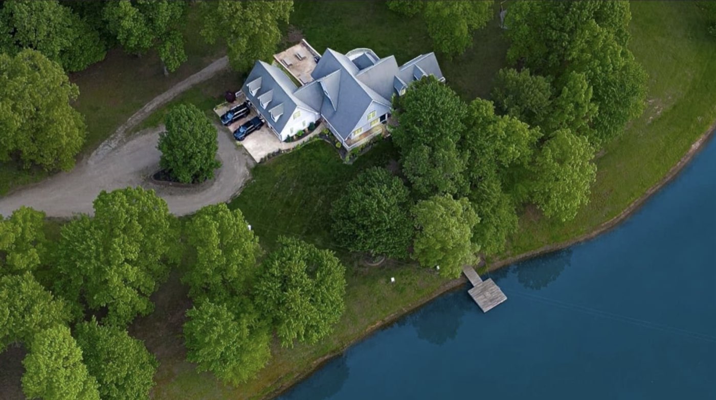 Aerial view of a lakefront short-term rental property
